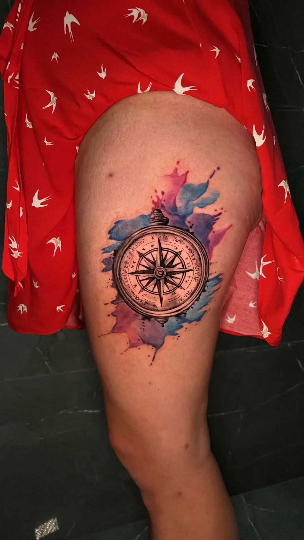 compass watercolor thigh tattoo