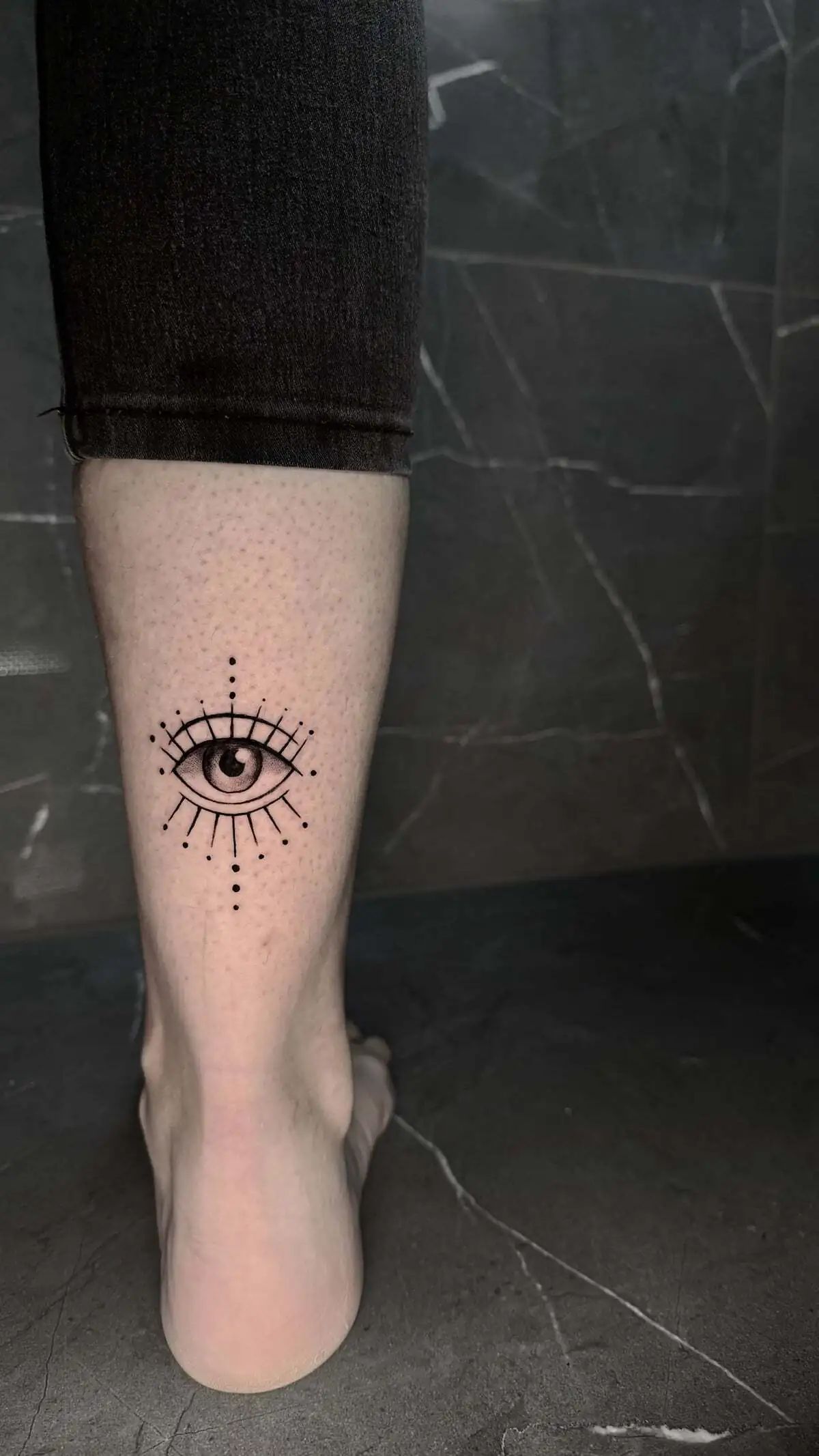 all seeing eye geometric calf tattoo