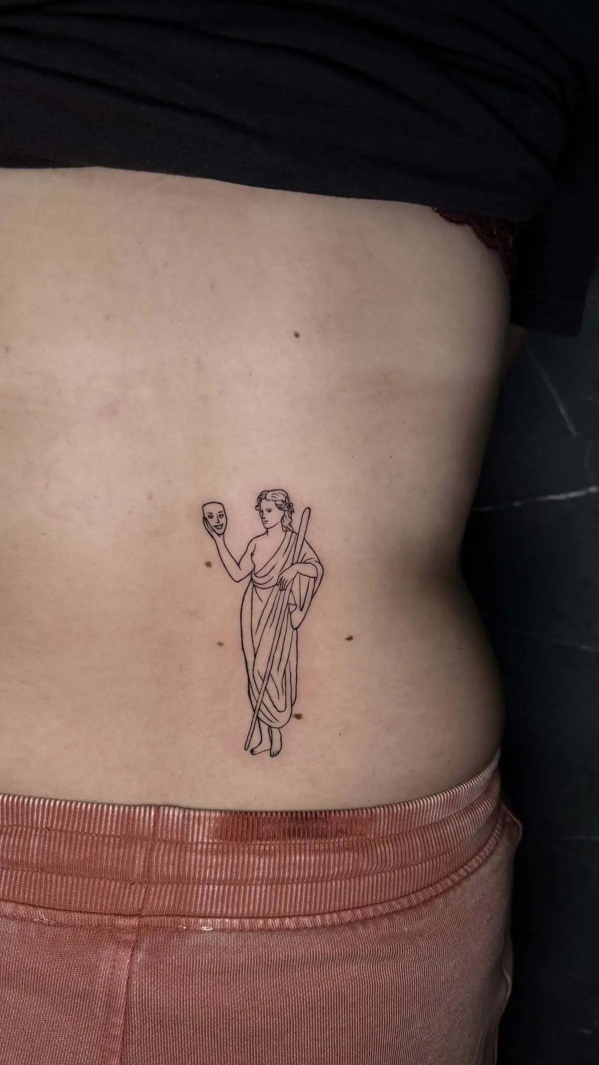 minimal greek statue figure back tattoo