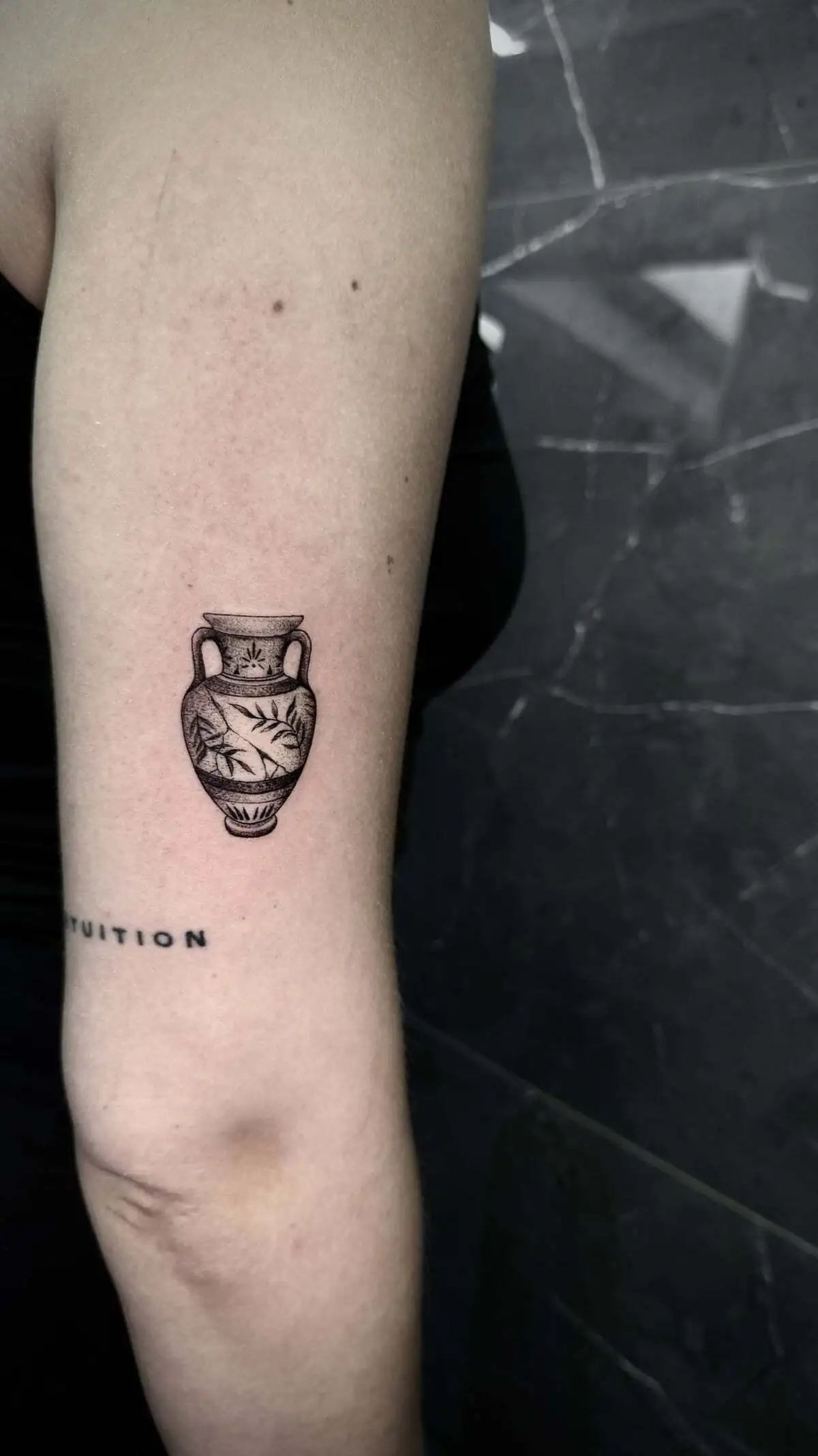 ancient greek amphora micro realism forearm tattoo