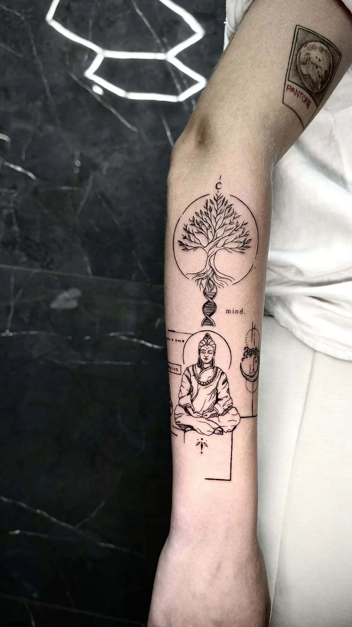 tree of life dna buddha micro realism forearm tattoo