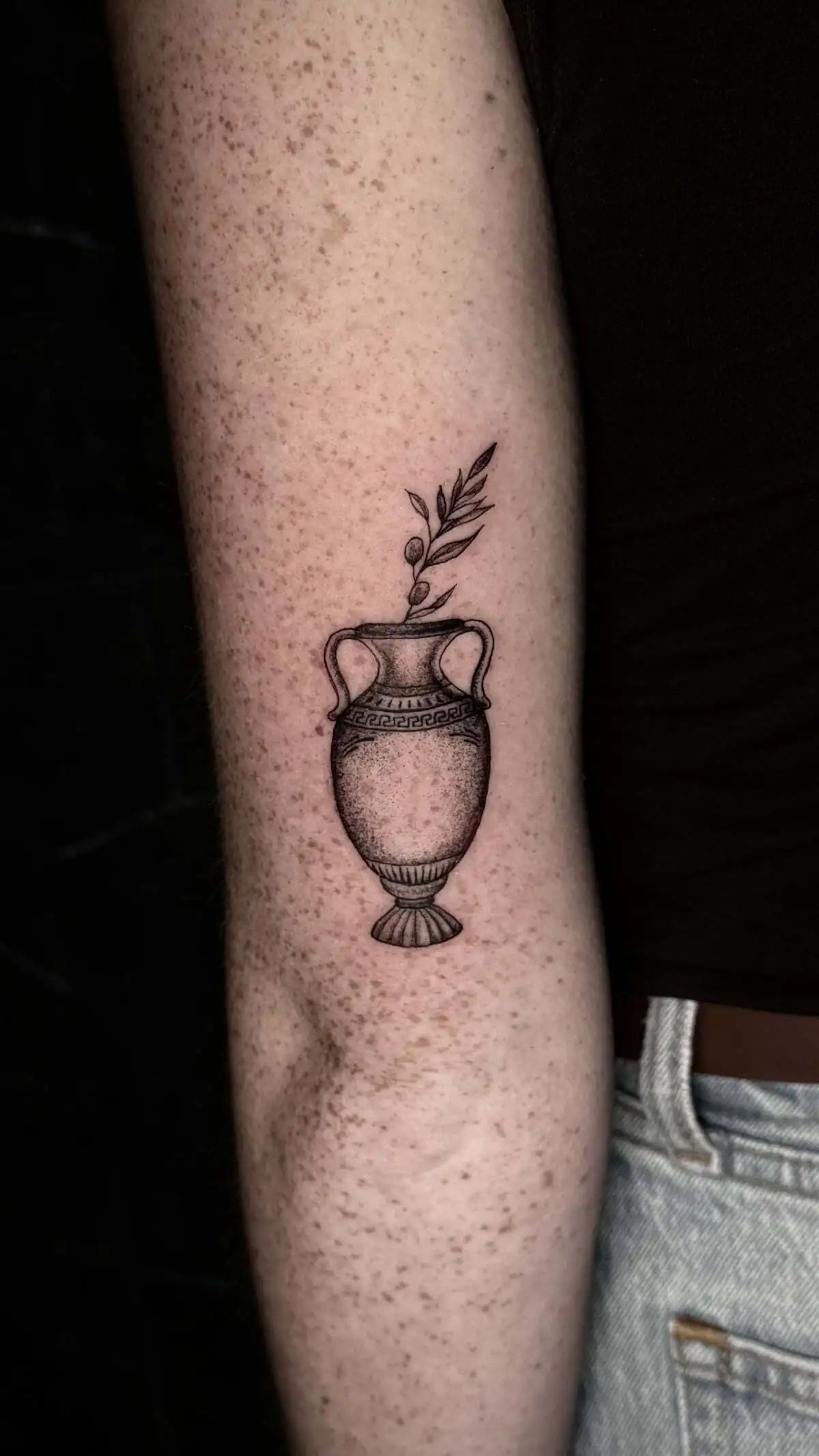 ancient greek amphora olive branch micro realism forearm tattoo